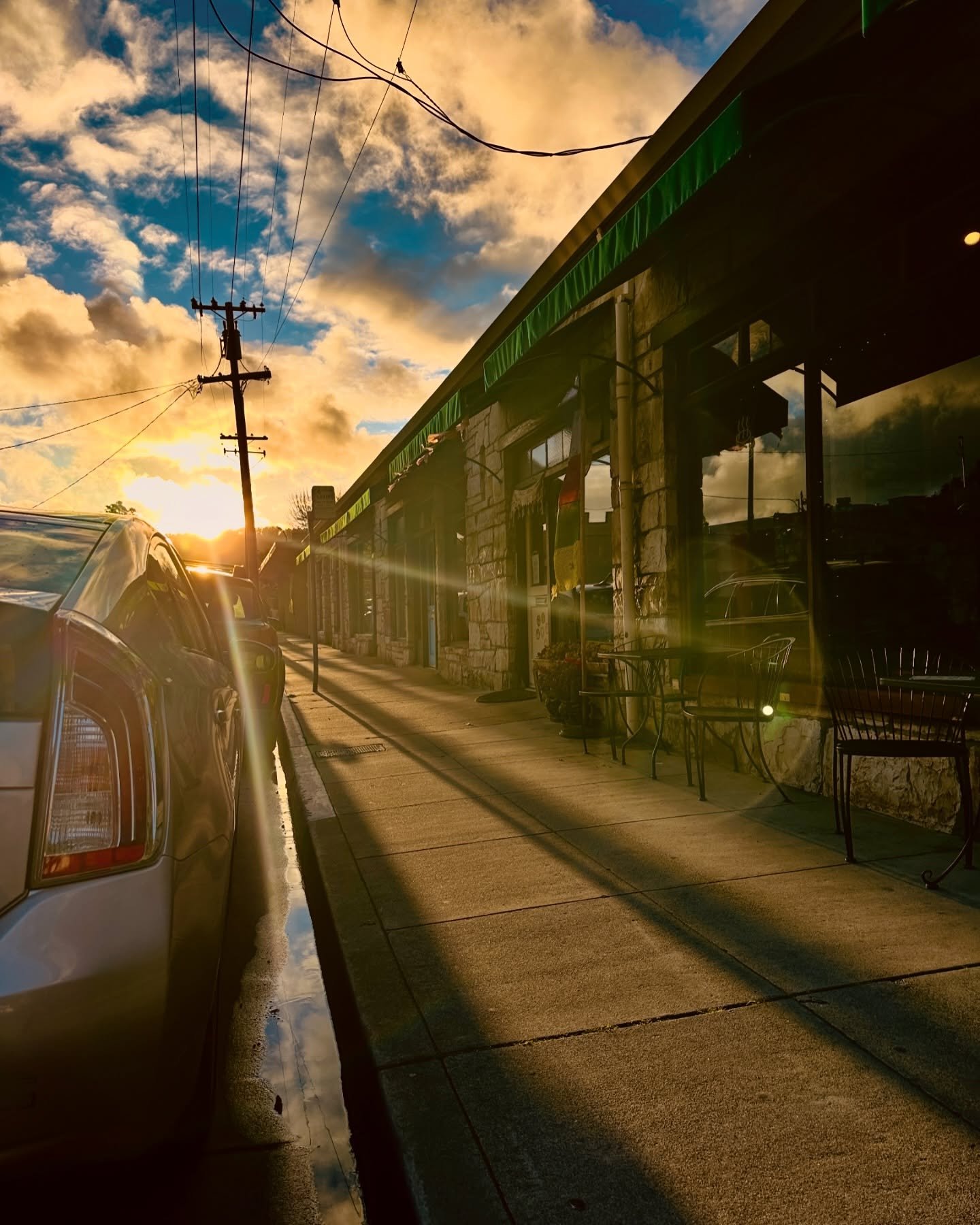 Golden-hour light down the street outside the cafe